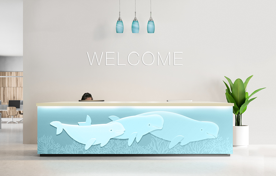 Reception/Front desk for an aquarium fitted with custom minimalist beluga whale sculptures