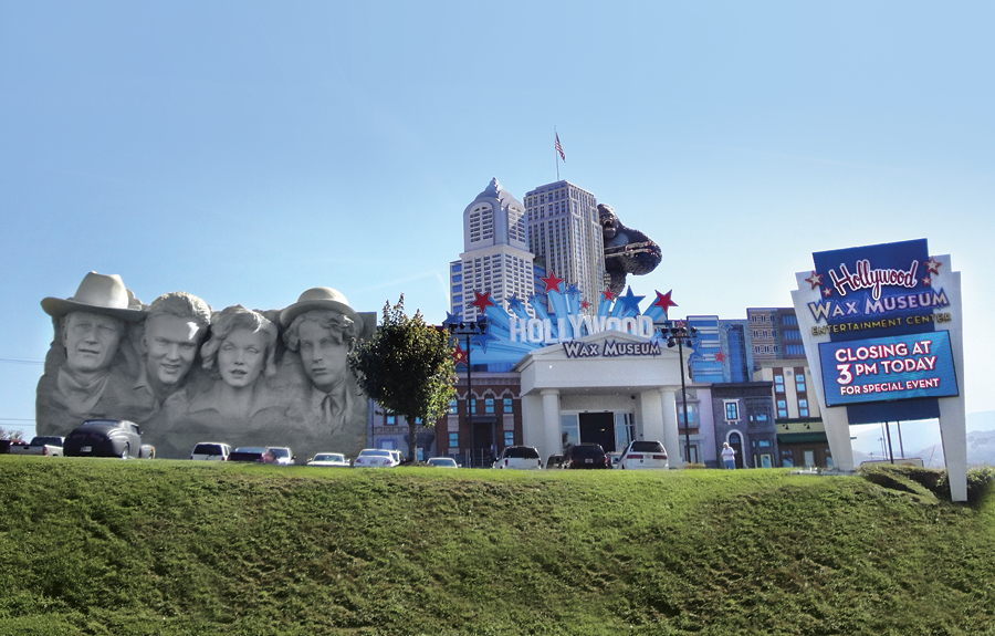 Hollywood Wax Museum outdoor shot featuring giant 3D sculpted foam displays including the world's largest gorilla