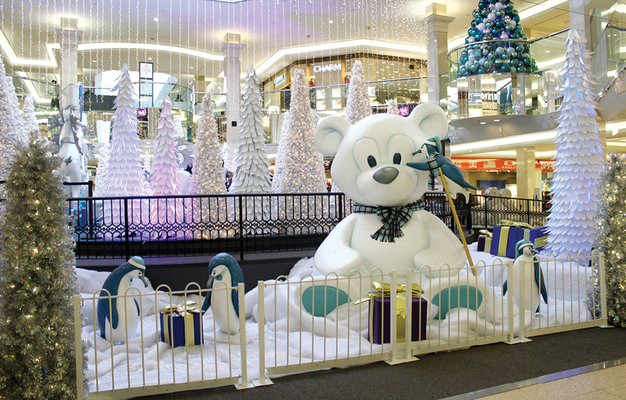 Mall display with custom christmas décor of penguins and teddy bears