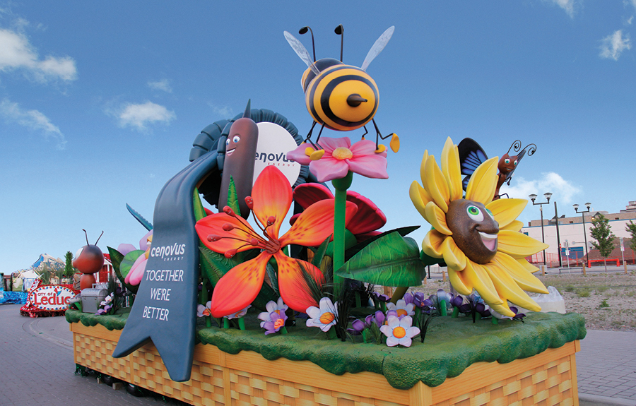 Flower basket themed parade float with custom designed foam flowers and bugs made for Cenovus