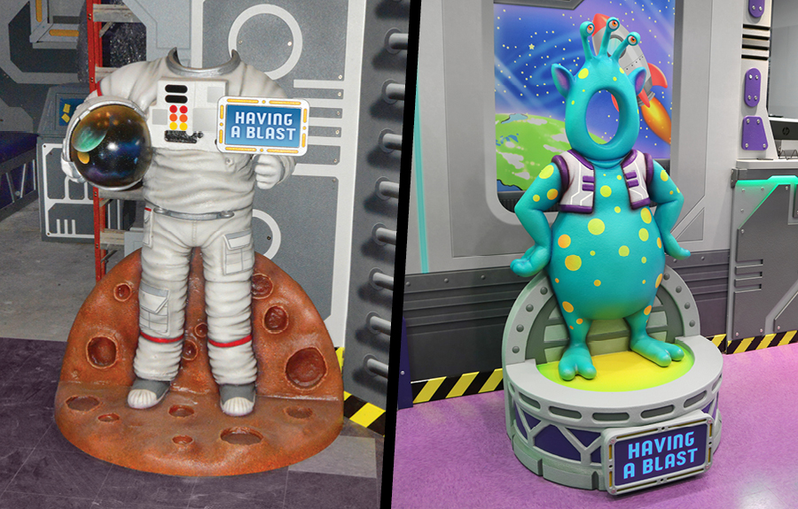 3D sculpted photo op cut outs designed like an astronaut suit and a colorful alien